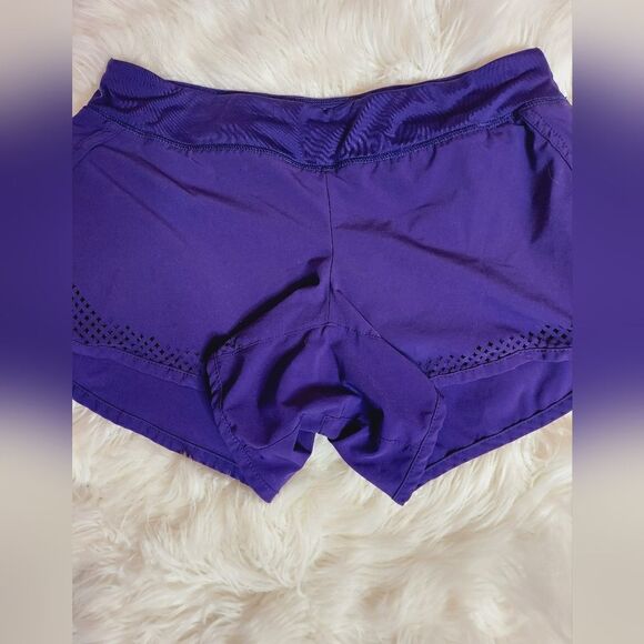 Athleta laser cutout hem purple 3" running shorts - Picture 8 of 10